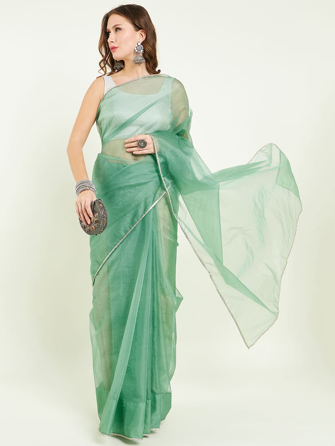 Organza saree with gota lace comes with matching gota patti blouse.