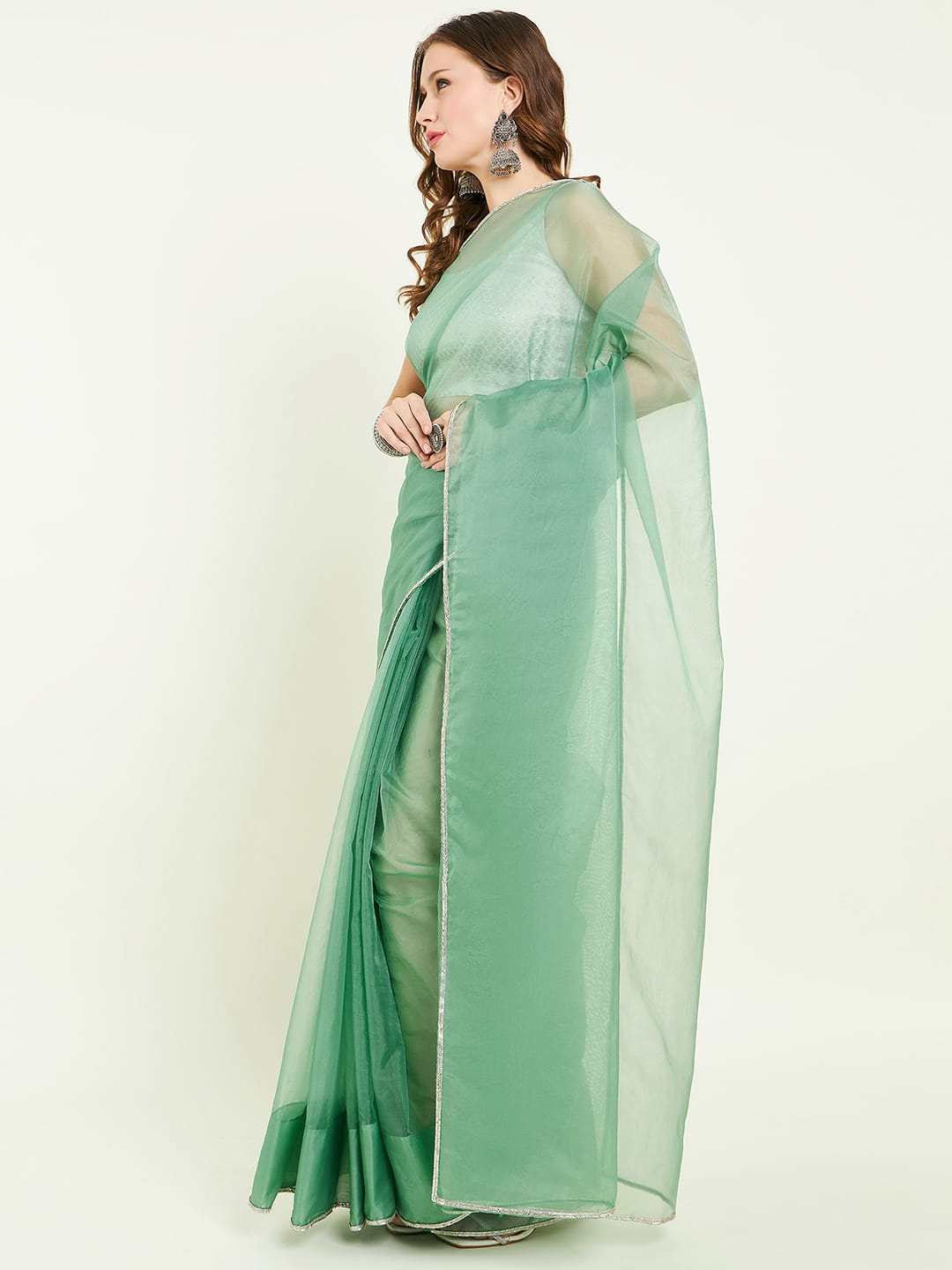 Organza saree with gota lace comes with matching gota patti blouse.