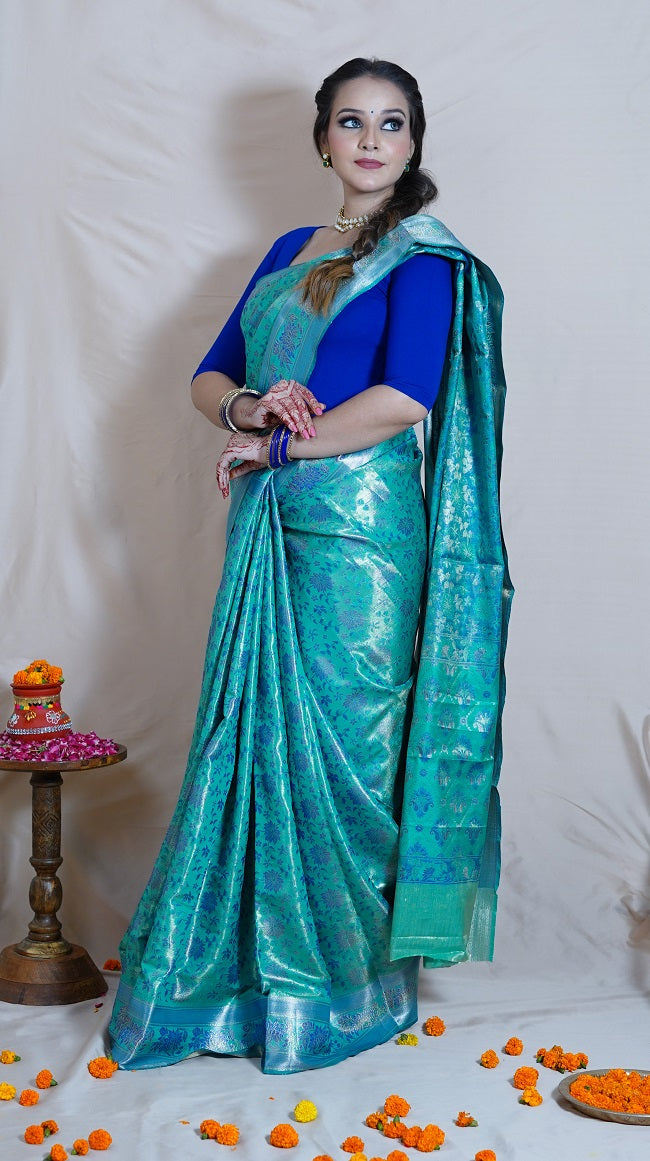 SEA GREEN AND BLUE TISSUE SILK SAREE WITH ALL OVER FLORAL DESIGN