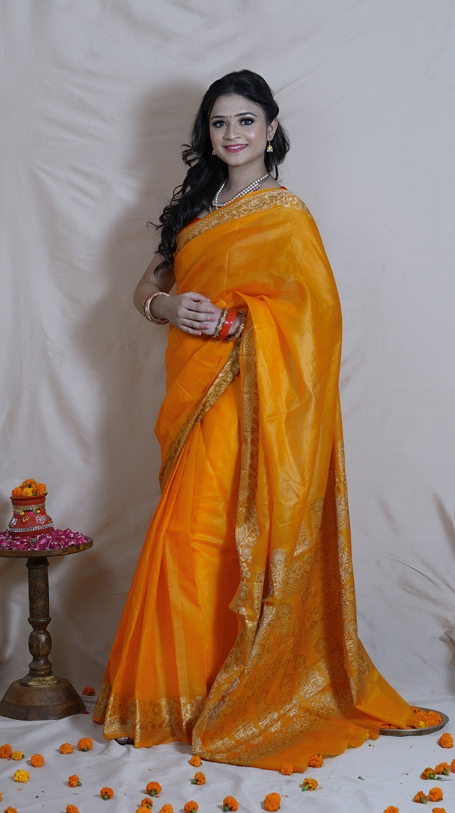 TURMERIC YELLOW TUSSAR SILK SAREE WITH BORDER DETAILING IN OFF WHITE AND BEIGE COLOR