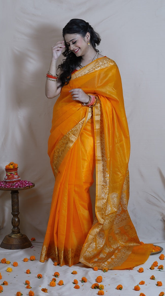 TURMERIC YELLOW TUSSAR SILK SAREE WITH BORDER DETAILING IN OFF WHITE AND BEIGE COLOR