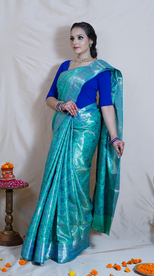 SEA GREEN AND BLUE TISSUE SILK SAREE WITH ALL OVER FLORAL DESIGN