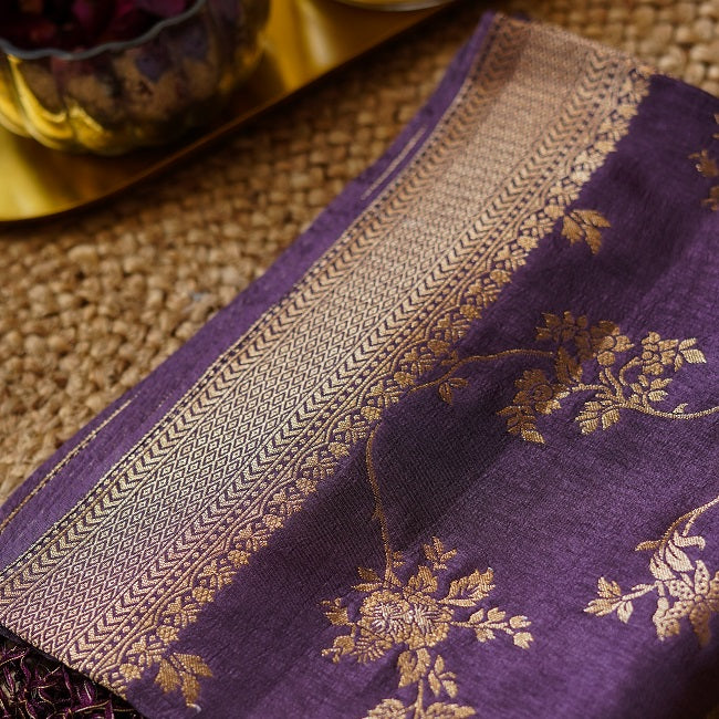 UNSTITCHED SUIT SET IN LILAC SHADE WITH MOTIFS ALL OVER. PAIRED WITH CONTRAST PURPLE BOTTOMS AND DUPATTA WITH JAAL WORK.