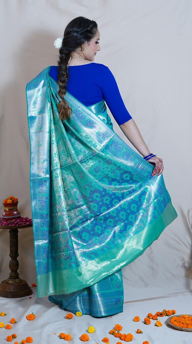 SEA GREEN AND BLUE TISSUE SILK SAREE WITH ALL OVER FLORAL DESIGN