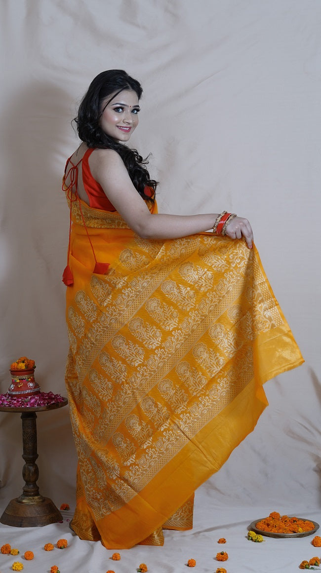 TURMERIC YELLOW TUSSAR SILK SAREE WITH BORDER DETAILING IN OFF WHITE AND BEIGE COLOR